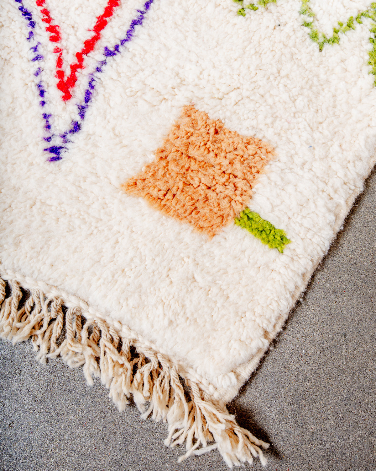 Modern, designer, handcrafted Berber rug from Morocco. Beniourain carpet with beautiful colours and patterns and fluffy wool texture.